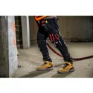 MILWAUKEE FREEFLEX™ Universal-Arbeitshose schwarz 245 g/m² / Größe 56 W40/L32